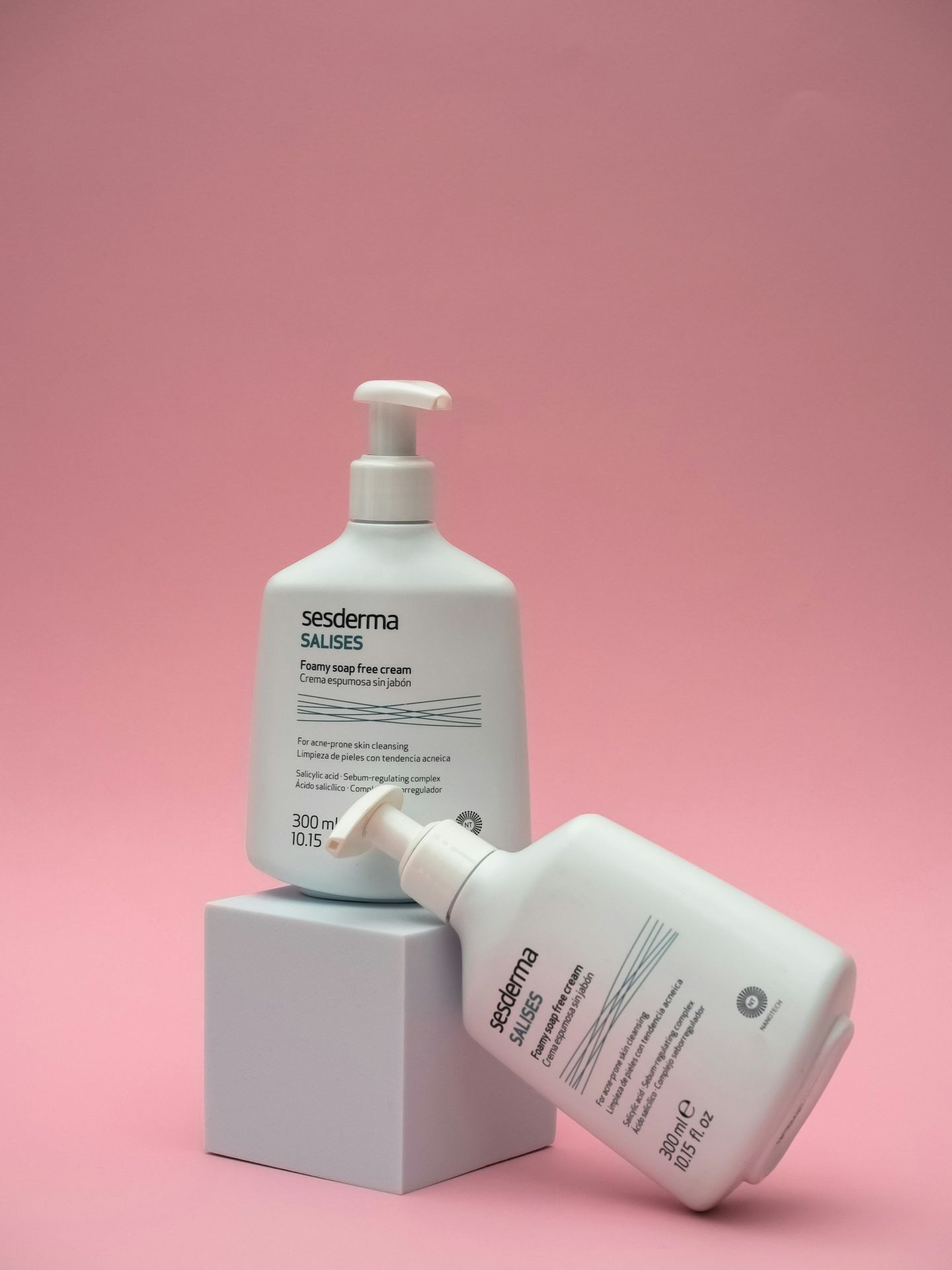 a bottle of lotion sitting on top of a box